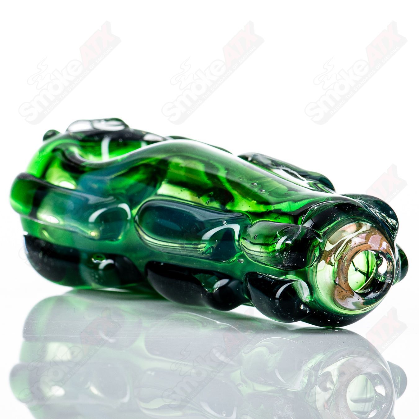 Clear glass spoon pipe with a rounded bowl and straight stem, designed by Nobody for smooth smoking sessions.