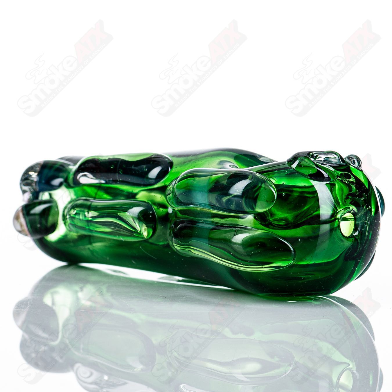 Glass pipe called the #75 Spoon Glass by Nobody, featuring a clear glass design with a bowl and mouthpiece for smoking.