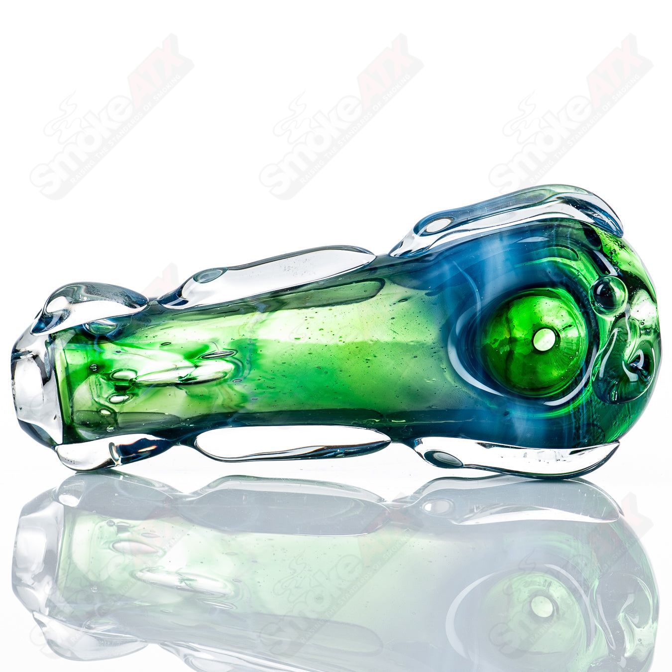 Glass pipe titled #77 Spoon Glass by Nobody, featuring a clear glass construction with a rounded bowl and smooth mouthpiece.