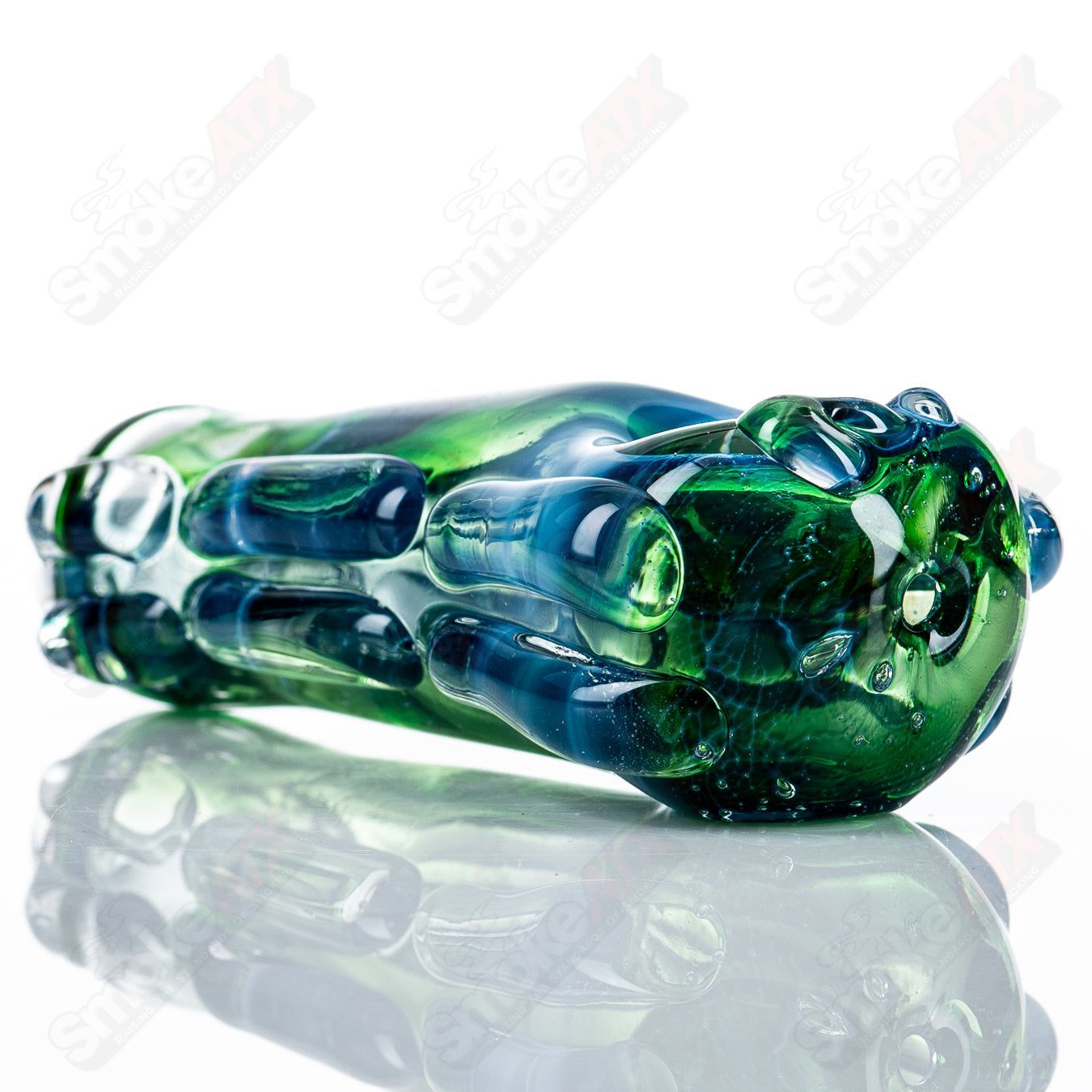 Glass pipe called #77 Spoon by Nobody, featuring a clear glass design with a rounded bowl and smooth mouthpiece for smoking.