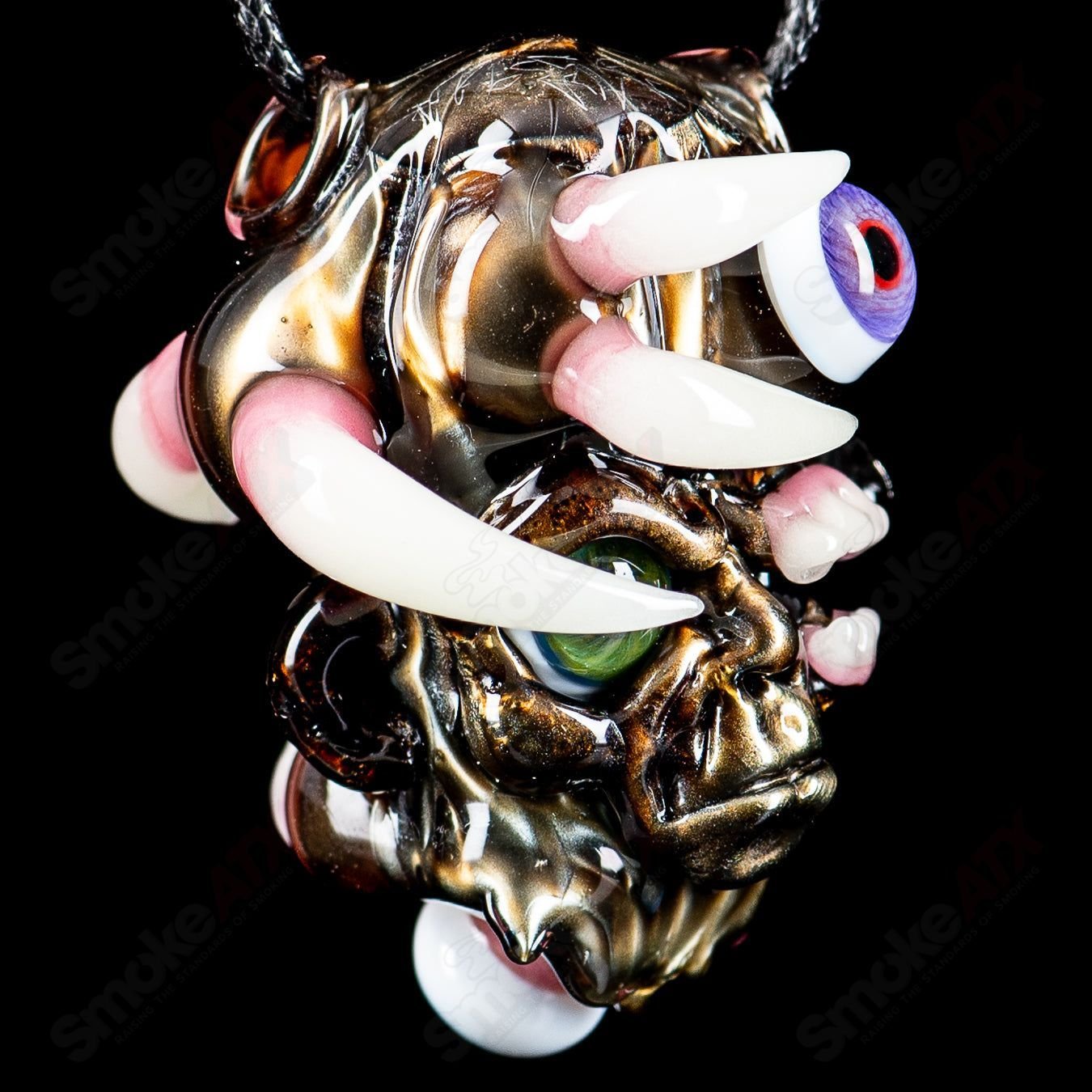 Colorful Electroid pendant by Blu Sun x SALT, handcrafted heady glass jewelry with vibrant, intricate glass art details.