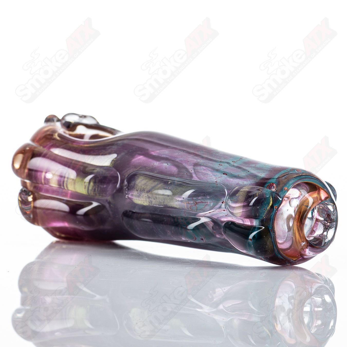 Clear glass Key Spoon pipe by Nobody, featuring a 79-key design, with intricate glasswork and a smooth, rounded bowl shape.
