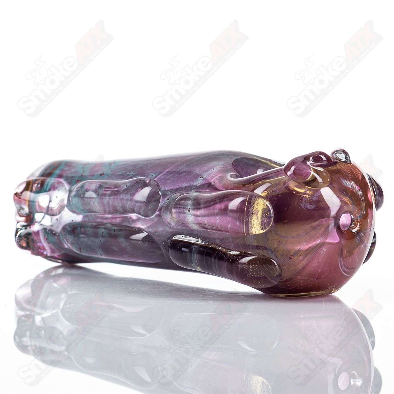 Glass pipe called the 79-Key Spoon by Nobody, featuring a clear glass design with smooth curves and a functional bowl.