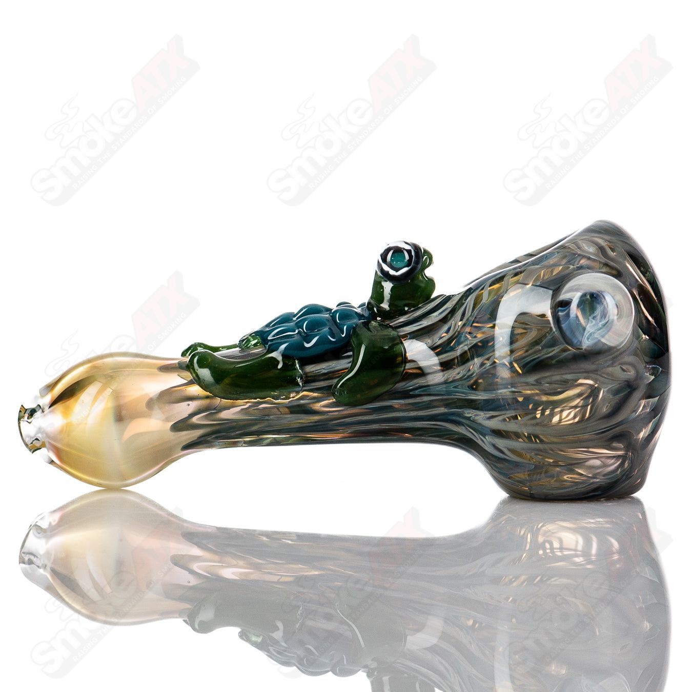 Molten Imagination #8 Critter Spoon glass hand pipe featuring a detailed critter design on clear glass.