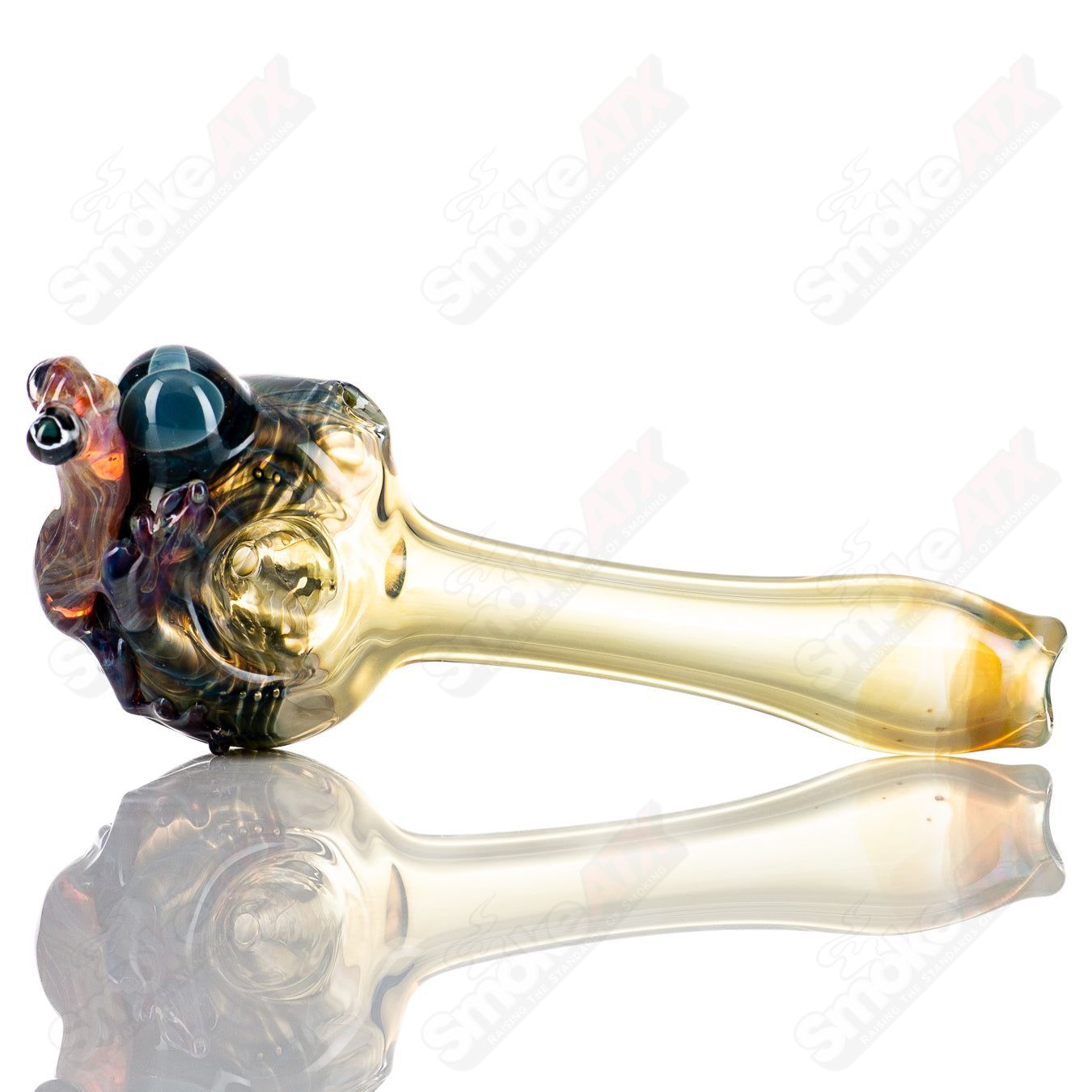 Hand-blown glass #8 Critter Spoon by Molten Imagination featuring colorful critter design and ergonomic shape for smoking.