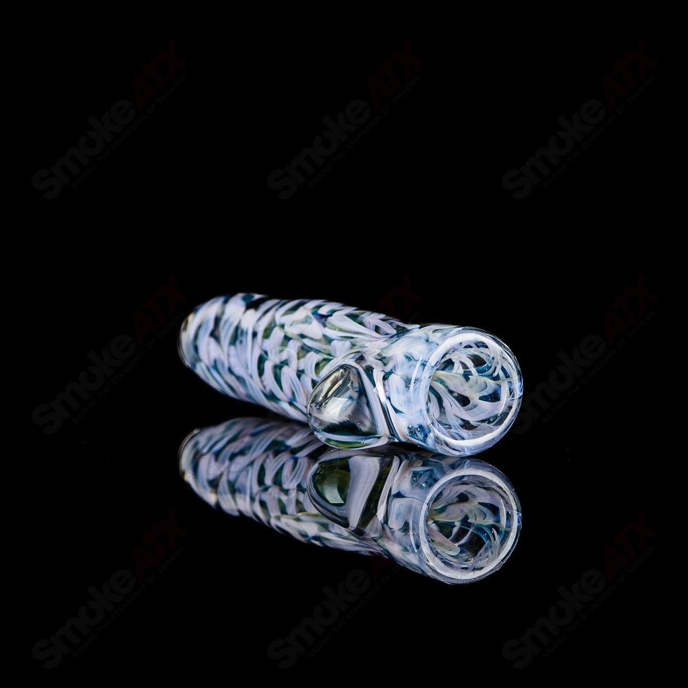 Signed JMK Glass #8 I/O Worked Chillum, clear glass pipe with intricate worked design and signature detail, for smoking use.