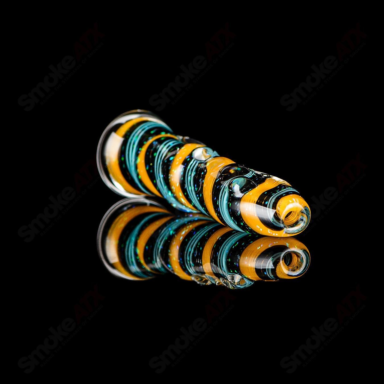 Glass chillum with colorful #8 opal design by Rotational Science, featuring a sleek, rounded shape and artistic glasswork.