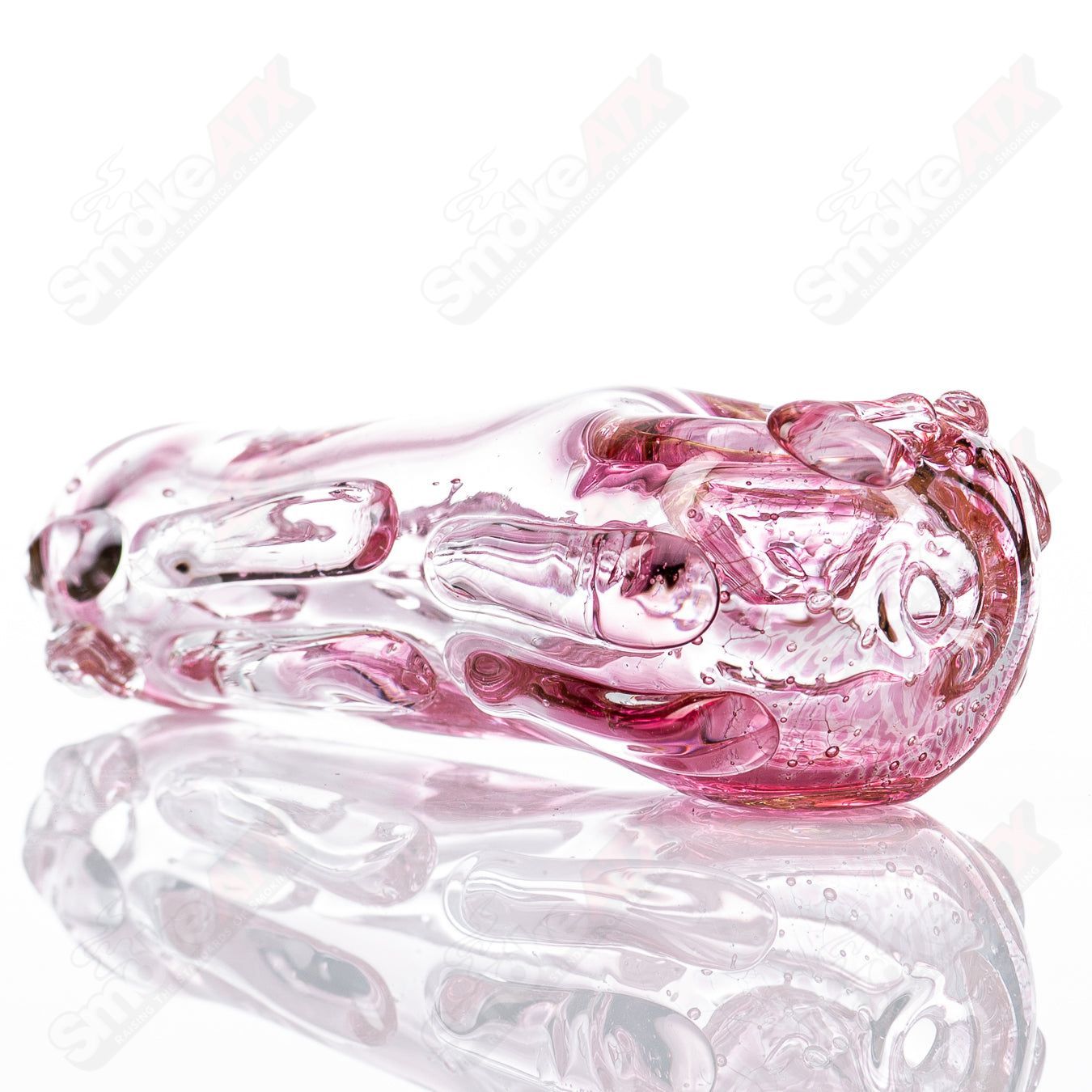 Glass pipe called #80 Spoon by Nobody, featuring clear glass with a smooth bowl and elongated neck for smoking.