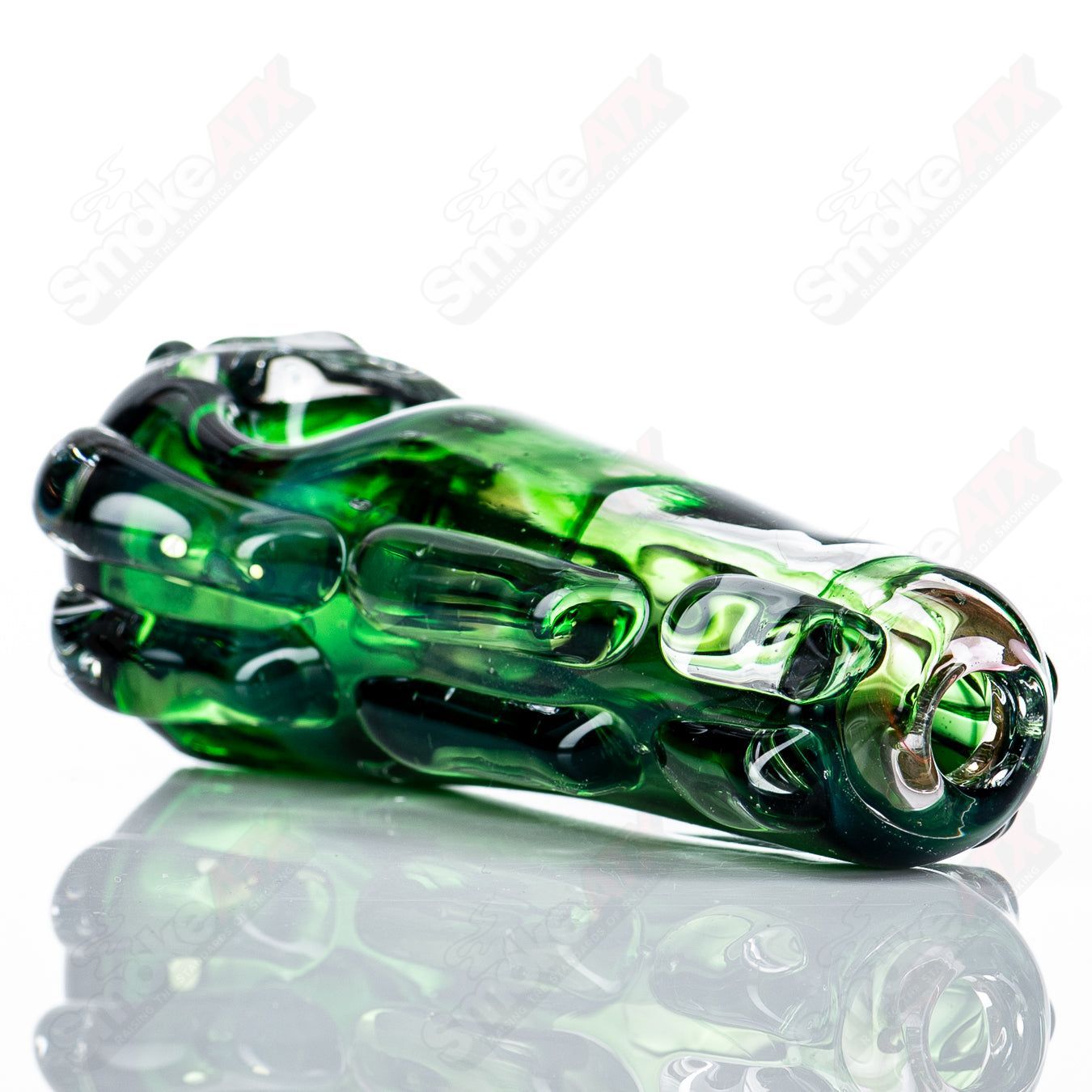 Glass pipe called Spoon Glass by Nobody, featuring a clear, rounded glass design with a bowl and mouthpiece for smoking.