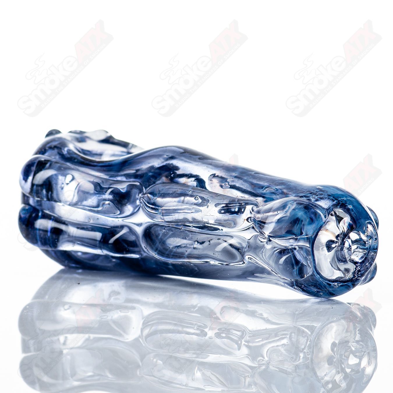 Glass pipe Spoon Glass by Nobody with a clear, smooth glass bowl and stem, designed for smoking use.