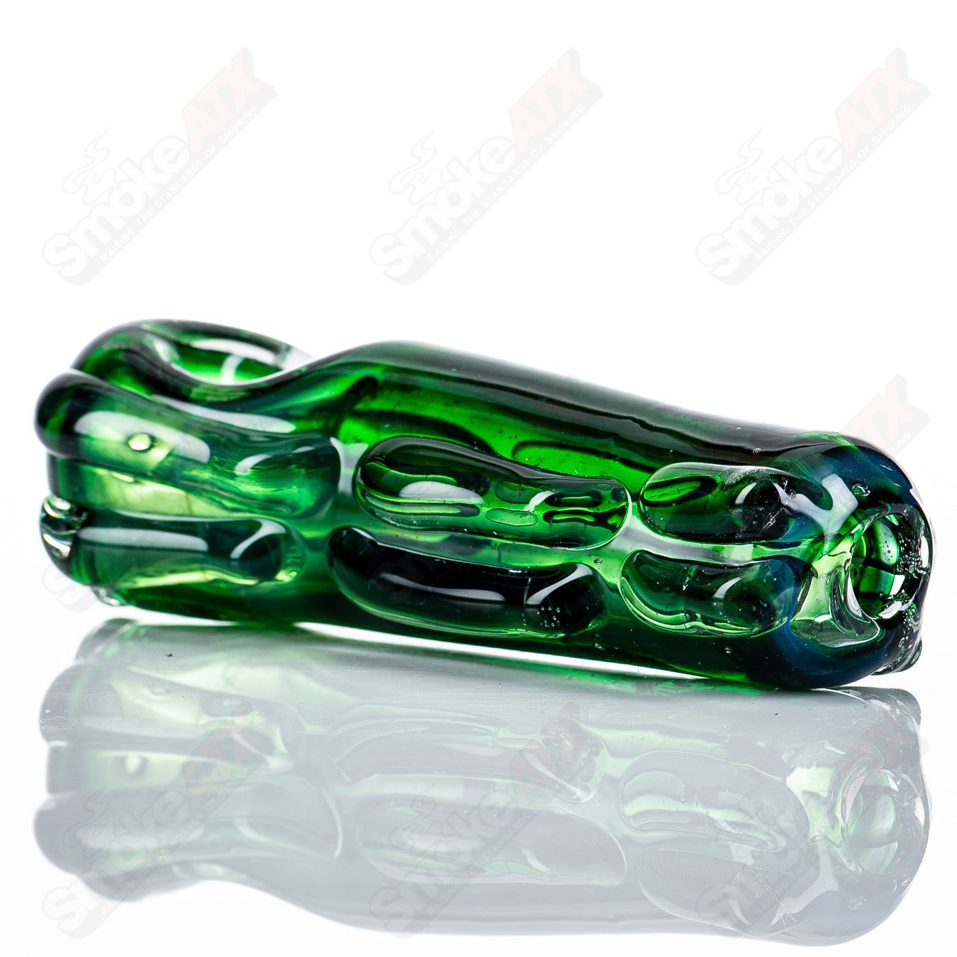 Glass pipe called Spoon Glass by Nobody, featuring a transparent glass design with a rounded bowl and smooth finish.
