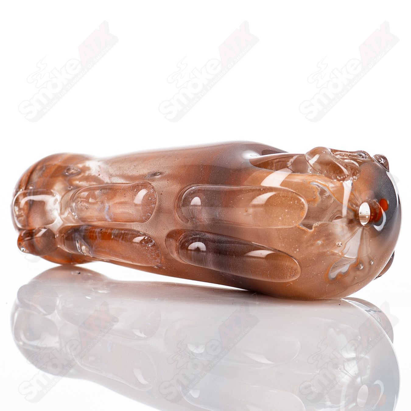 Glass pipe called Spoon Glass by Nobody, featuring a clear, smooth glass design with a rounded bowl and a long neck.