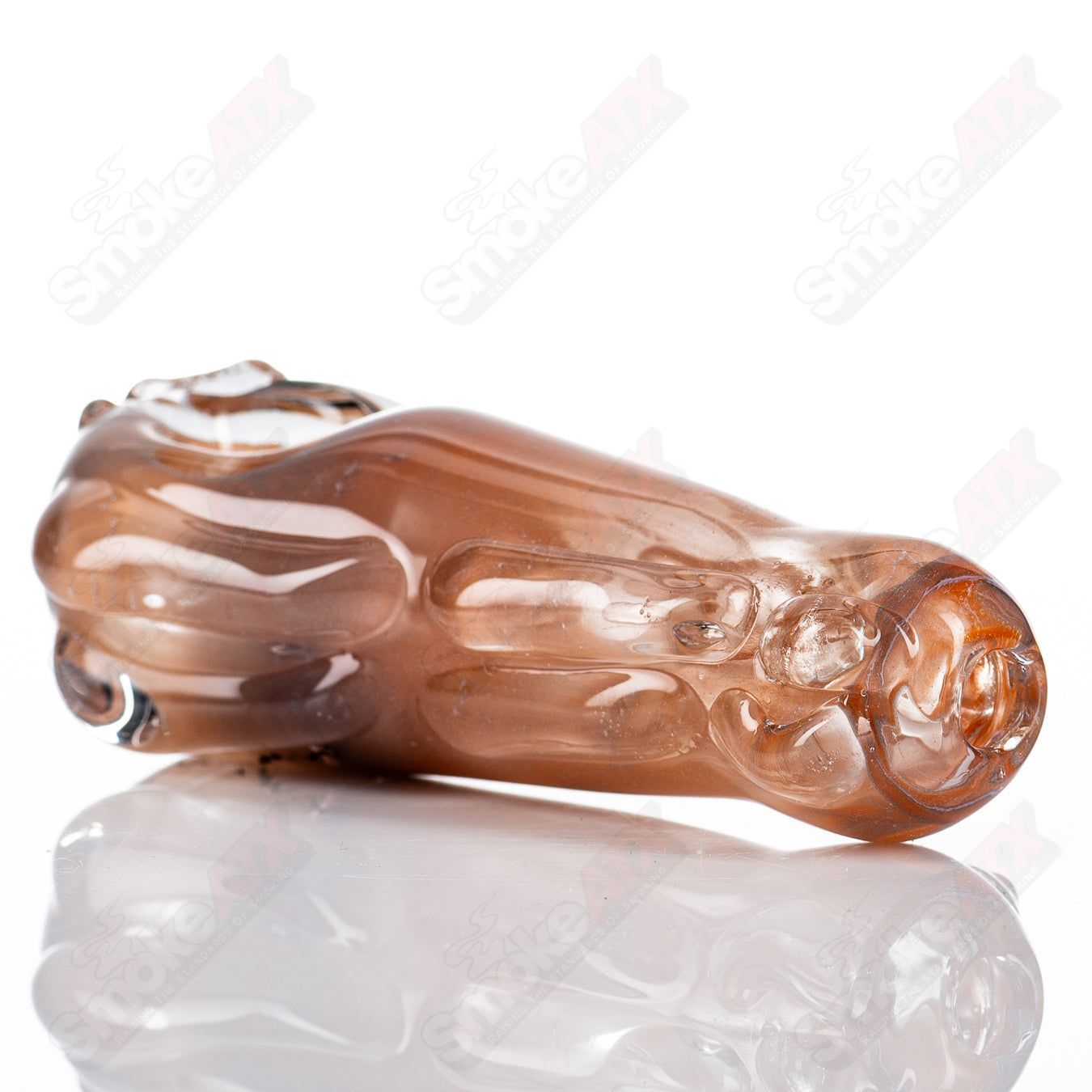 Glass pipe called Spoon Glass by Nobody, clear glass with a rounded bowl and straight stem, designed for smoking.