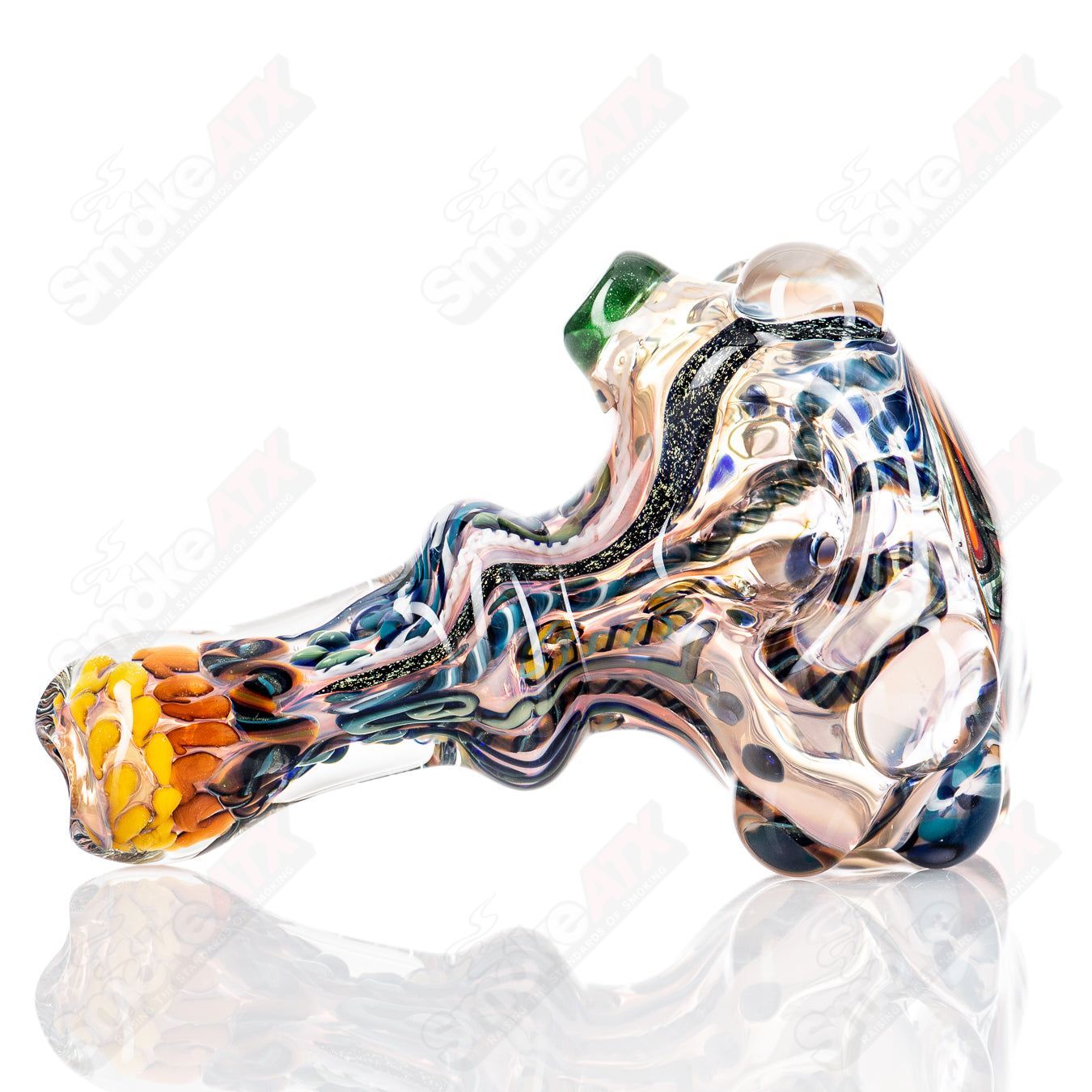 Molten Imagination Custom Glass Creations ISO Chaos Hammer Spoon with vibrant, swirling glass design and textured handle.