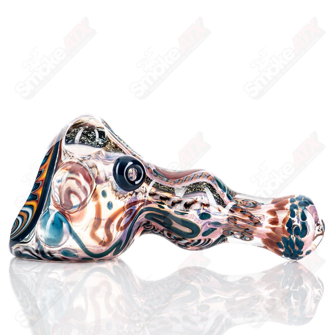 Molten Imagination Custom Glass Creations ISO Chaos Hammer Spoon, clear glass with intricate design and textured surface.