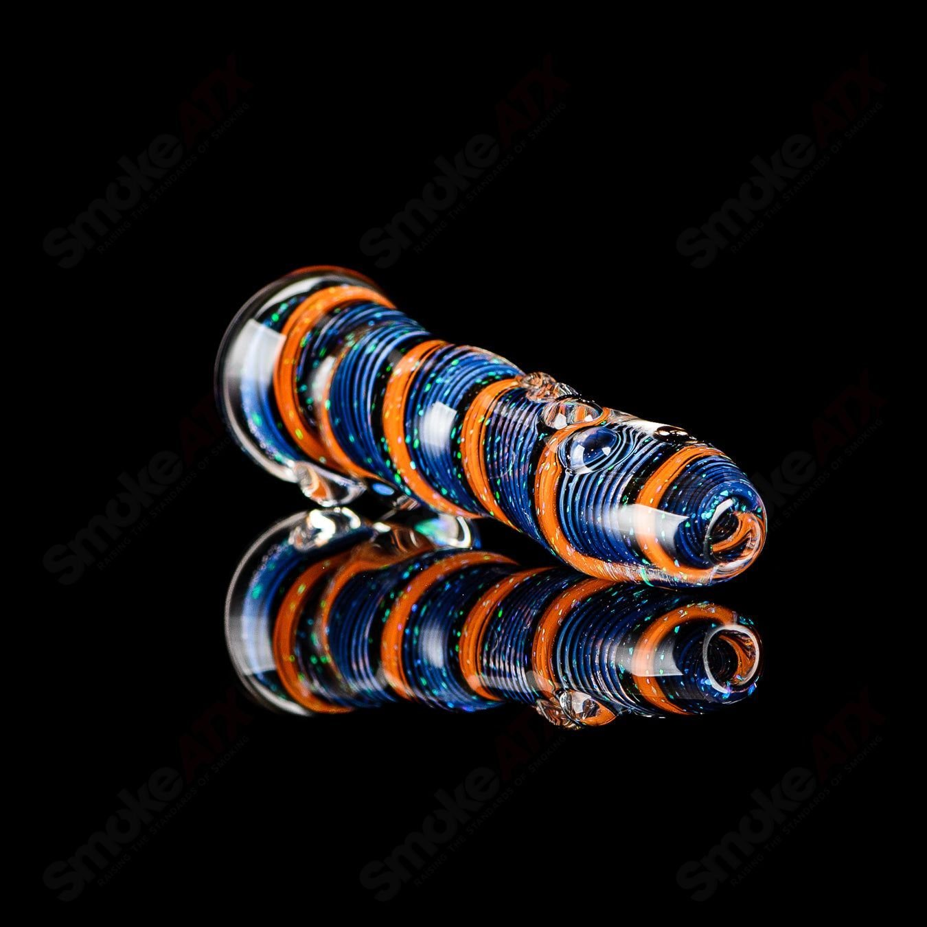 Glass chillum titled "#9 Opal Hitter" by Rotational Science, featuring a colorful opal design and smooth glass construction.