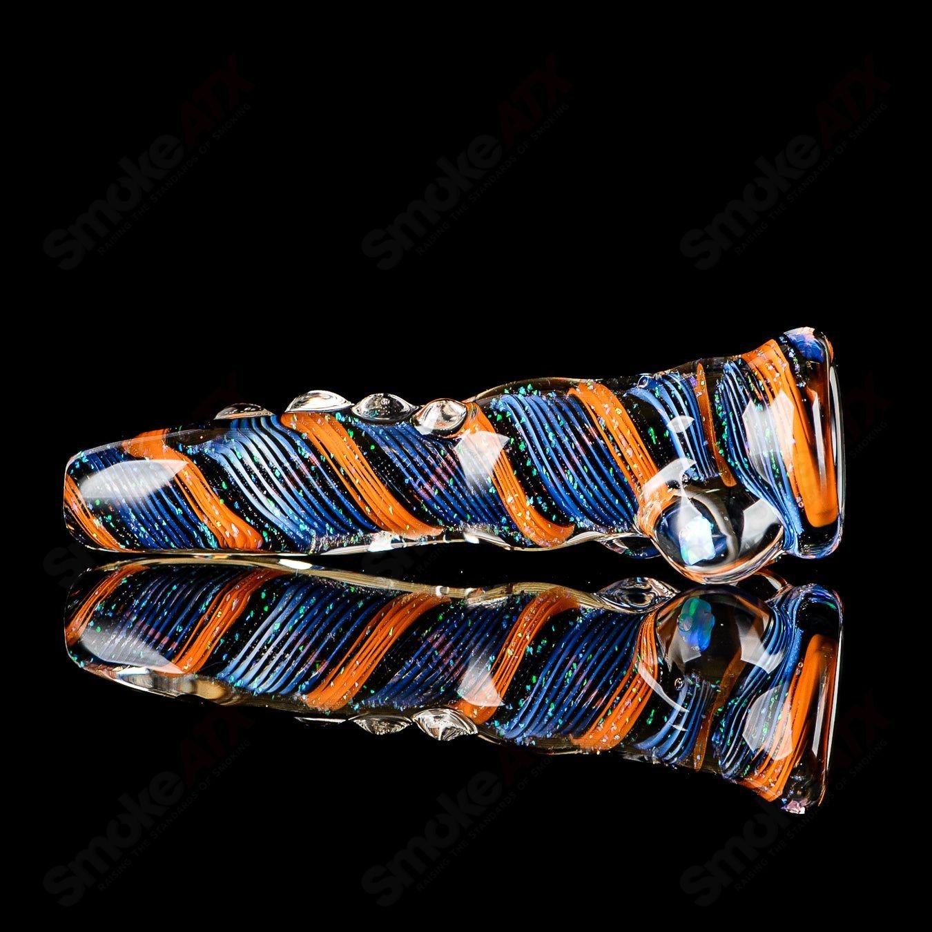 Clear glass chillum with a vibrant opal-colored hitter from Rotational Science, designed for smooth smoking sessions.