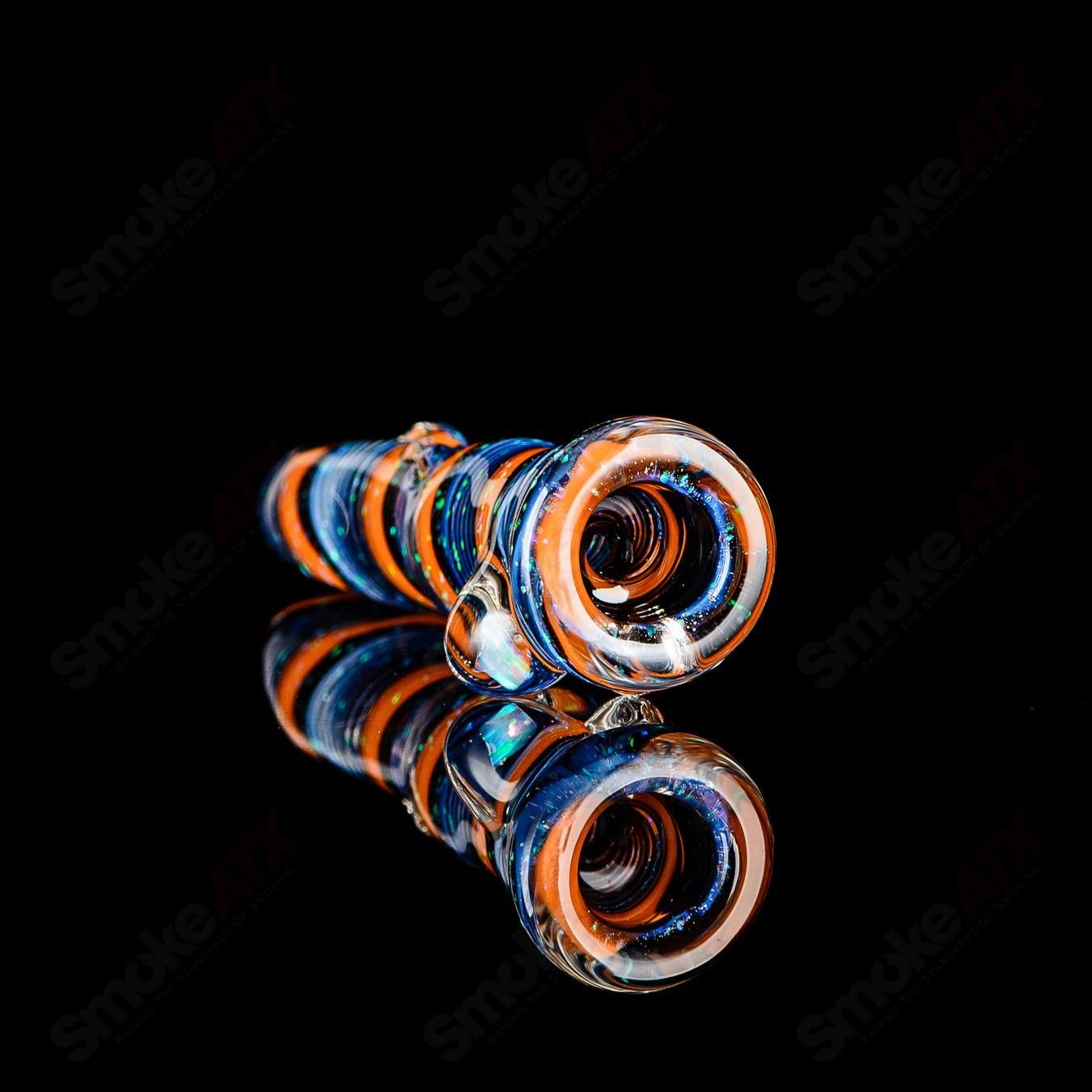 Glass chillum named the #9 Opal Hitter by Rotational Science, featuring colorful opal accents and a sleek design.