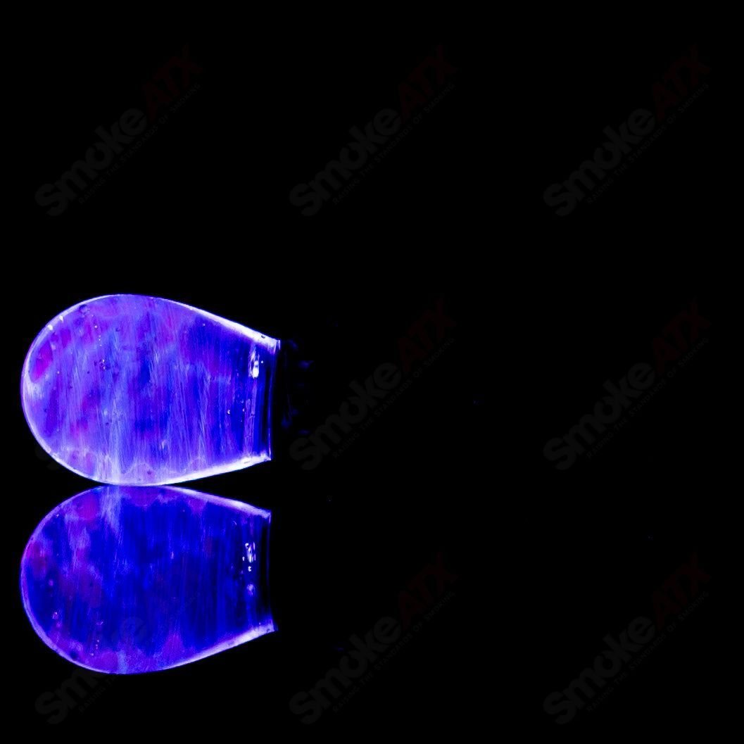 Colorful UV Puffco Joystick Indo heady glass Puffco top by Geoff Made Glass featuring a vibrant, artistic design.