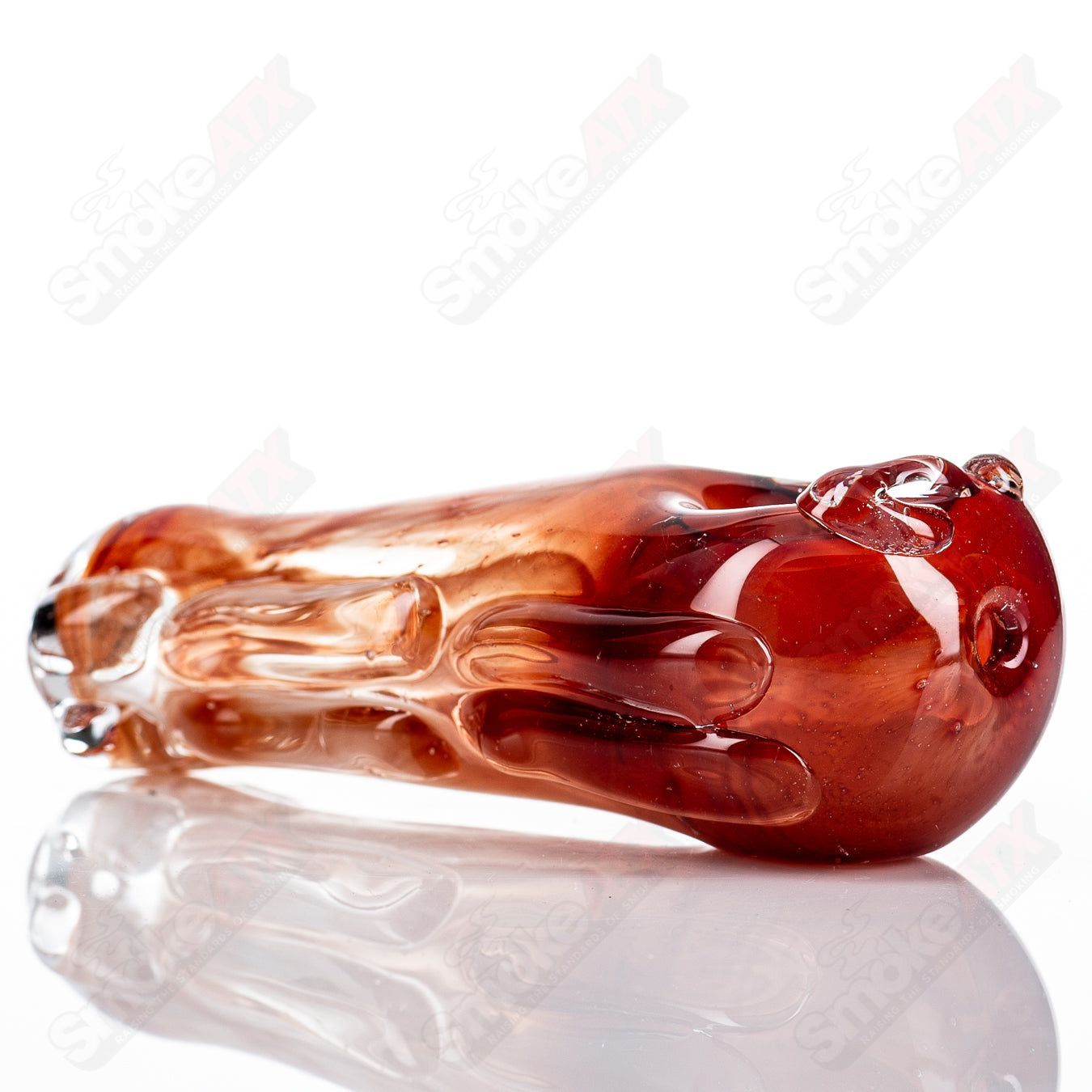 Glass pipe called the #90 Spoon by Nobody, featuring a clear glass design with a rounded bowl and long stem for easy handling.