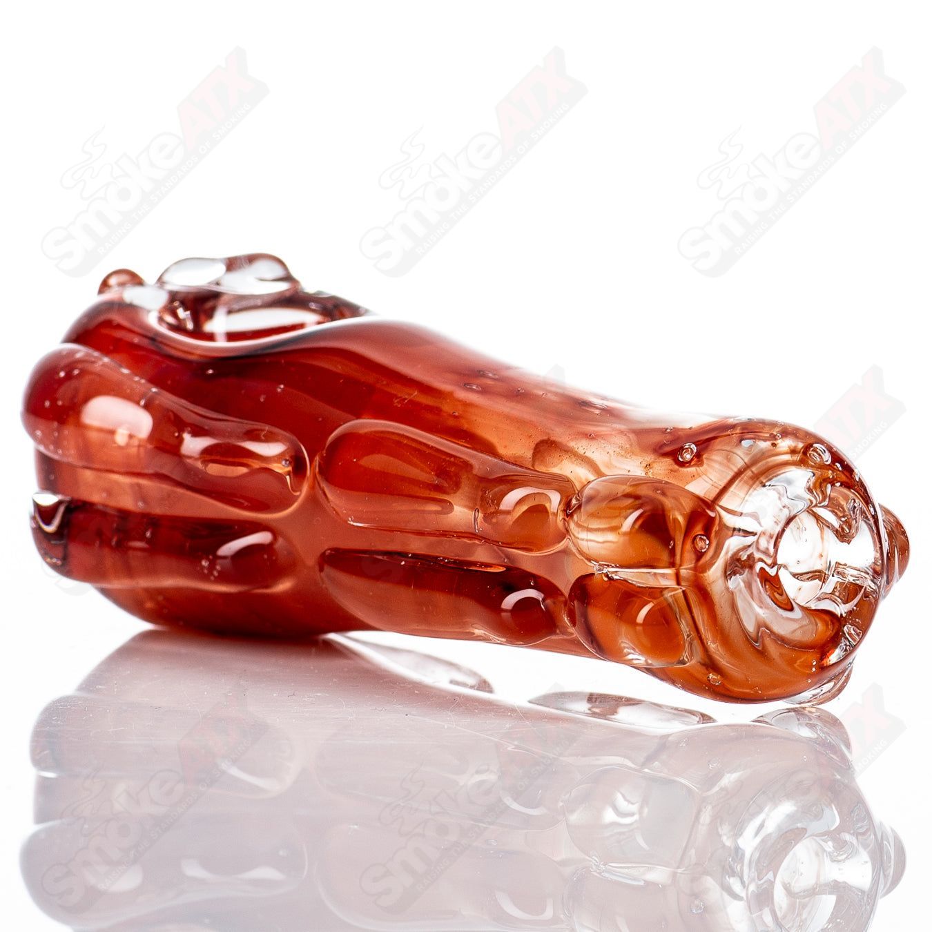 Clear glass spoon pipe with a rounded bowl and straight stem, designed by Nobody for smooth smoking sessions.
