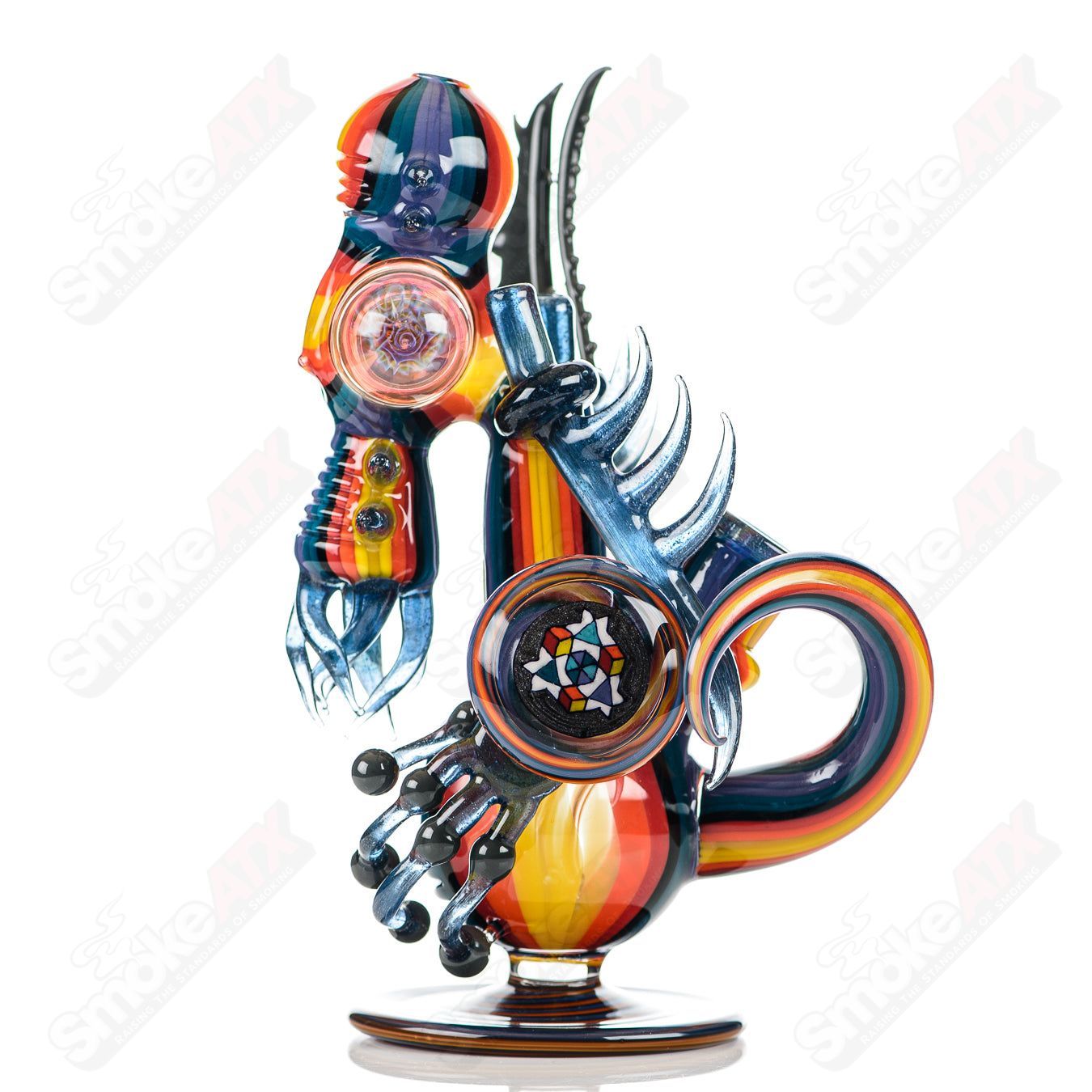 Alien Cthulhu rig by Freeek Glass, a colorful heady glass concentrate rig with alien and Cthulhu-themed design.