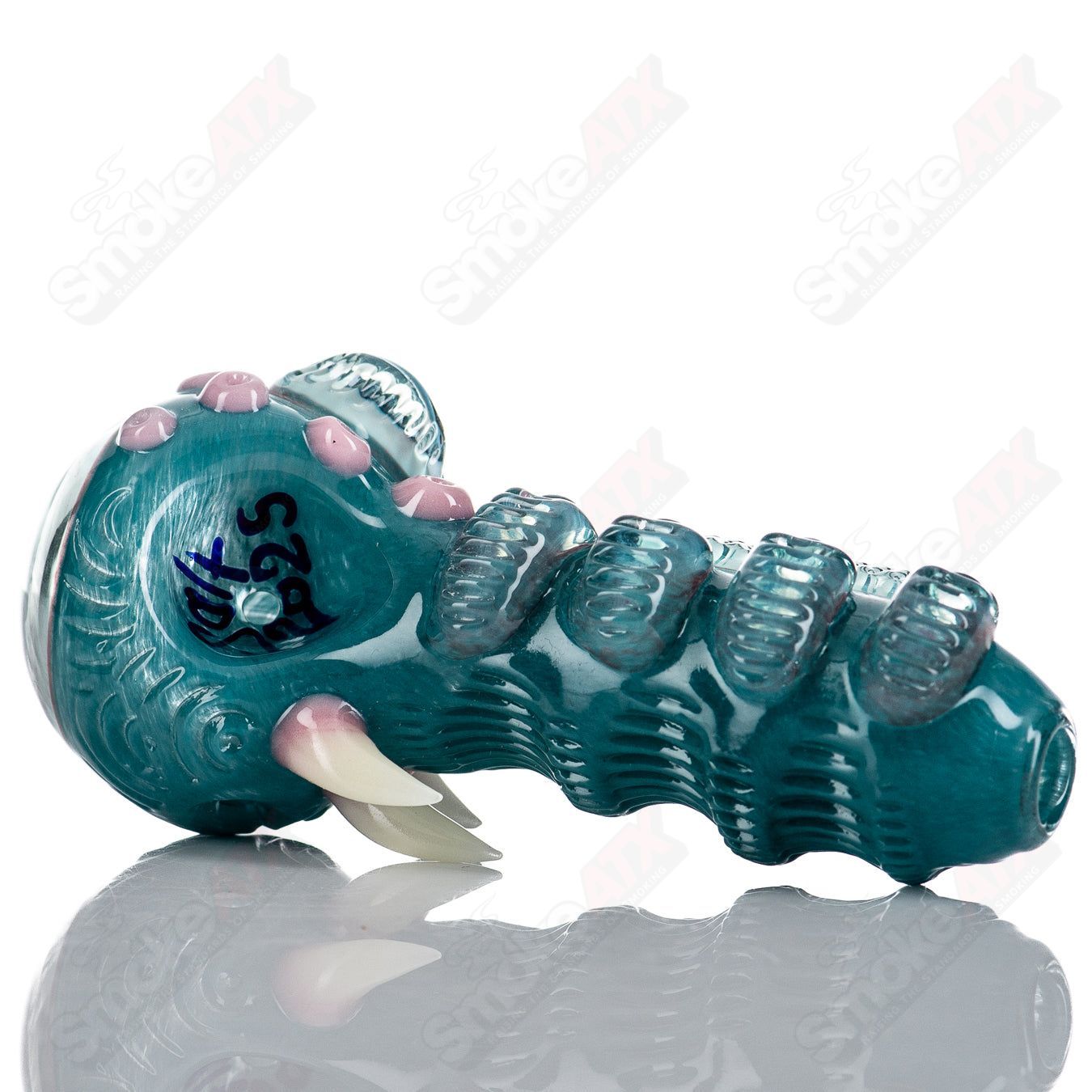 Aqua Azul Ether Spoon by Salt Glass, a hand pipe with vibrant blue glass and intricate details, designed for smooth smoking experiences.
