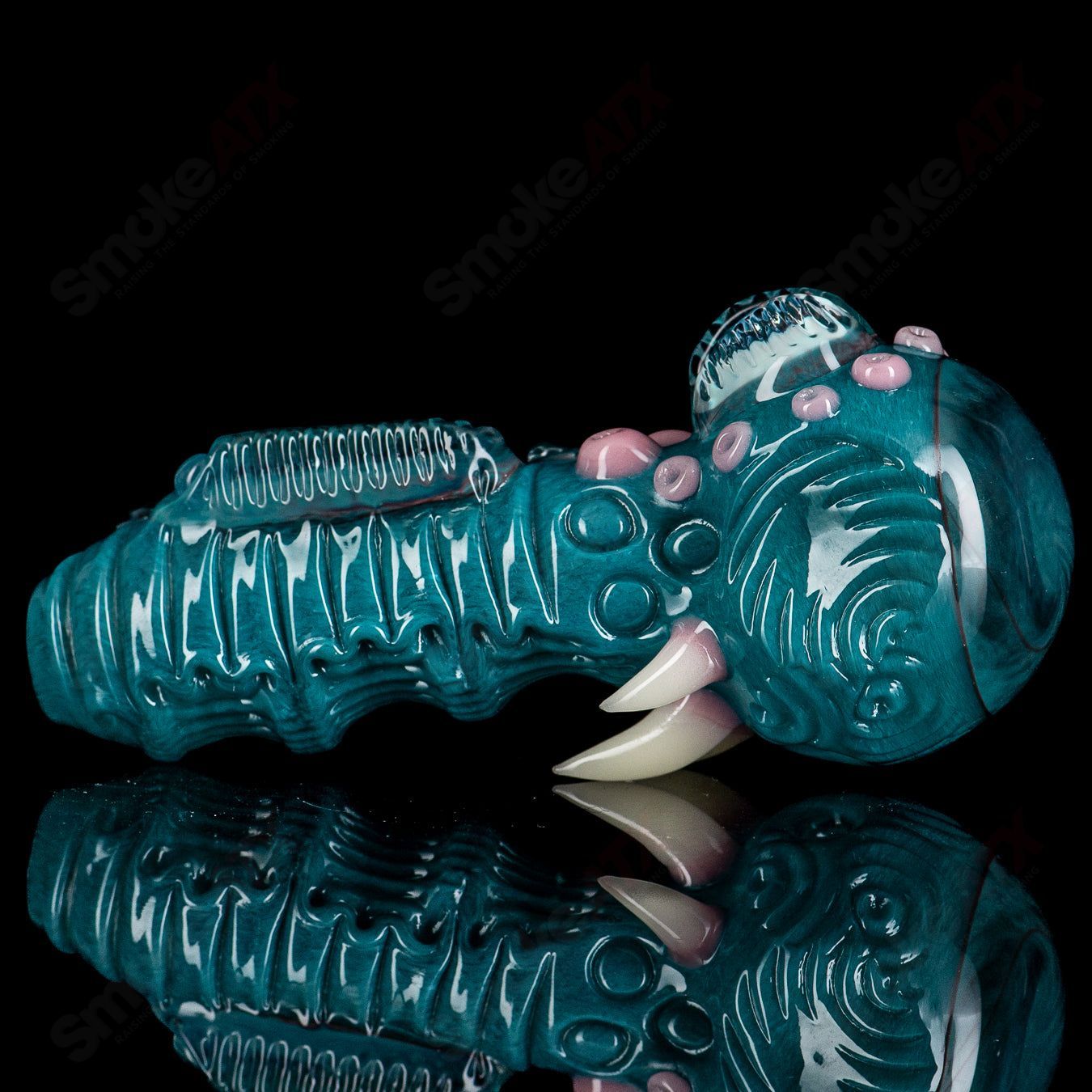 Aqua Azul Ether Spoon by Salt Glass, a colorful hand pipe made of heady glass with vibrant blue and aqua accents.