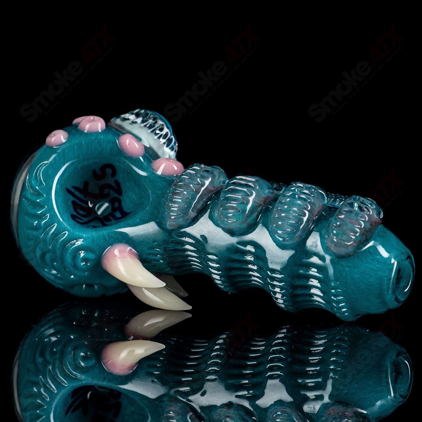 Aqua Azul Ether Spoon by Salt Glass, a colorful hand pipe with intricate glasswork in vibrant blue and aqua hues.