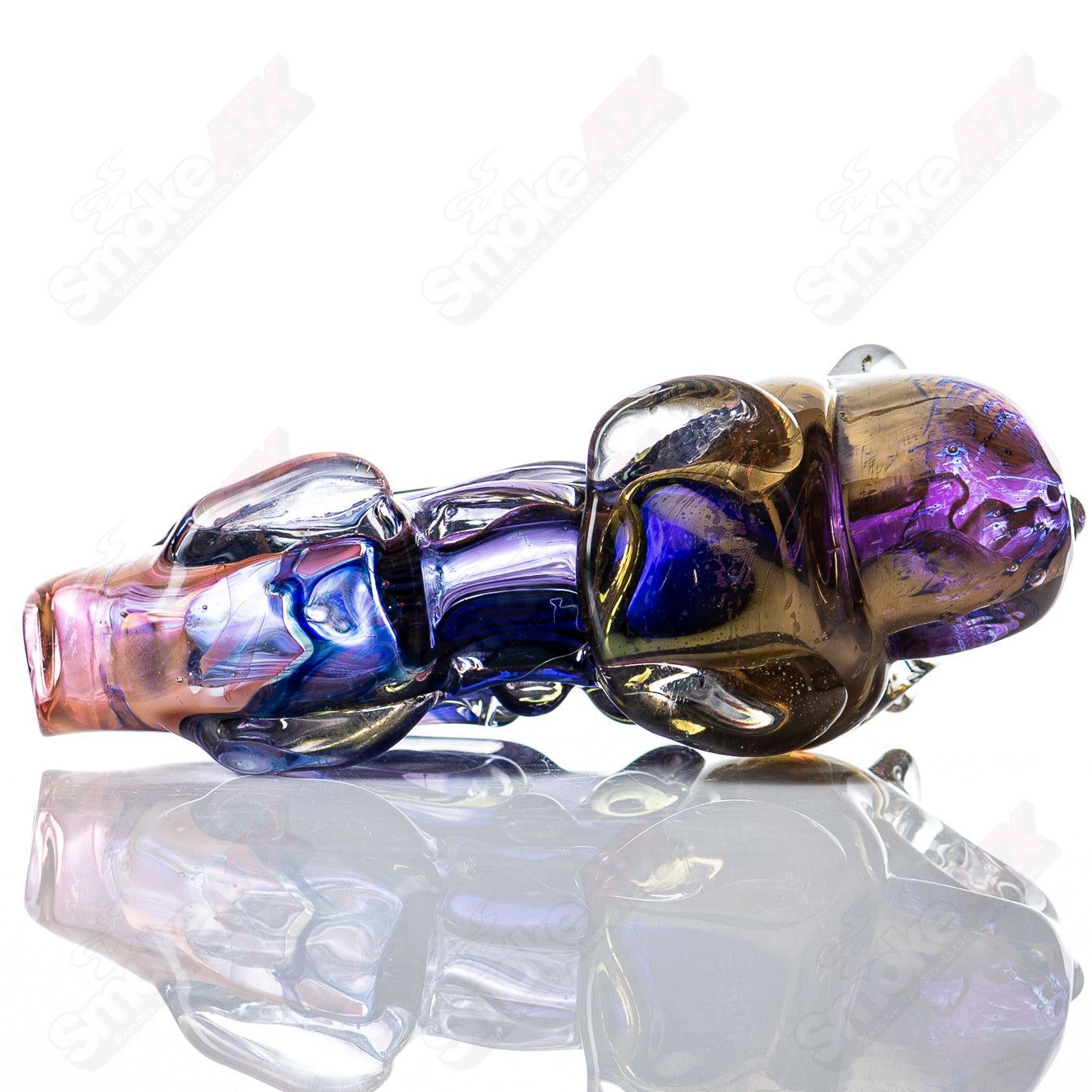 Glass pipe with a bear totem design by Nobody, featuring clear glass construction and detailed bear motif.