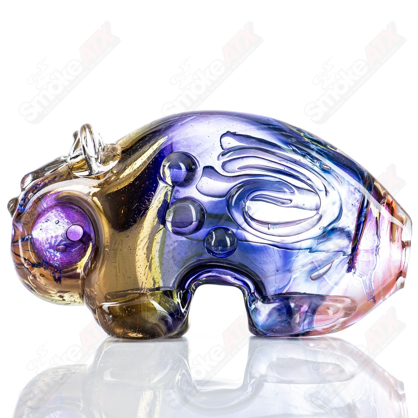 Glass pipe by Nobody featuring a detailed bear totem design, made of clear glass with smooth curves and a sturdy bowl.