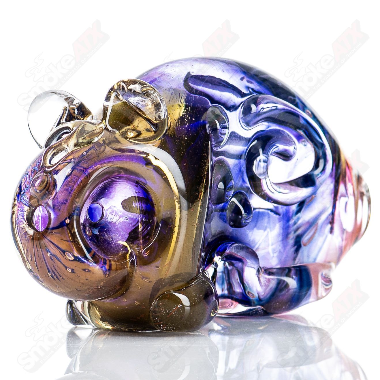 Glass pipe shaped like a bear totem with colorful glass accents, designed by Nobody, for use as a smoking pipe.