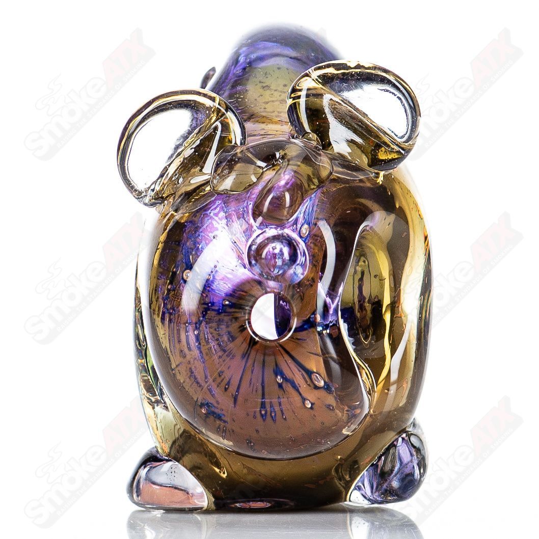 Glass pipe featuring a bear totem design by Nobody, crafted from clear glass with detailed bear imagery.