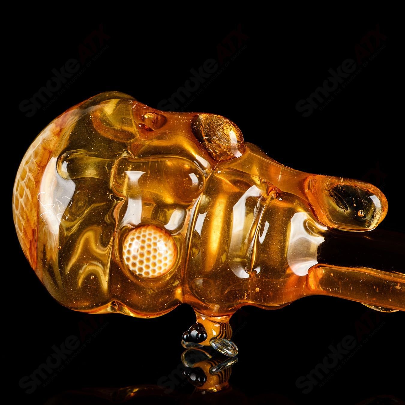Joe P Glass Beehive Honeycomb Spoon Hand Pipe with detailed glasswork and honeycomb design, perfect for smooth, enjoyable use.