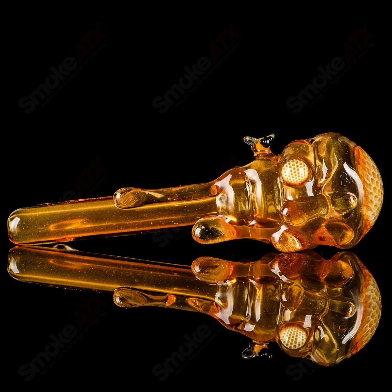 Joe P Glass Beehive Honeycomb Spoon Hand Pipe with intricate glasswork and detailed honeycomb design for smoking.