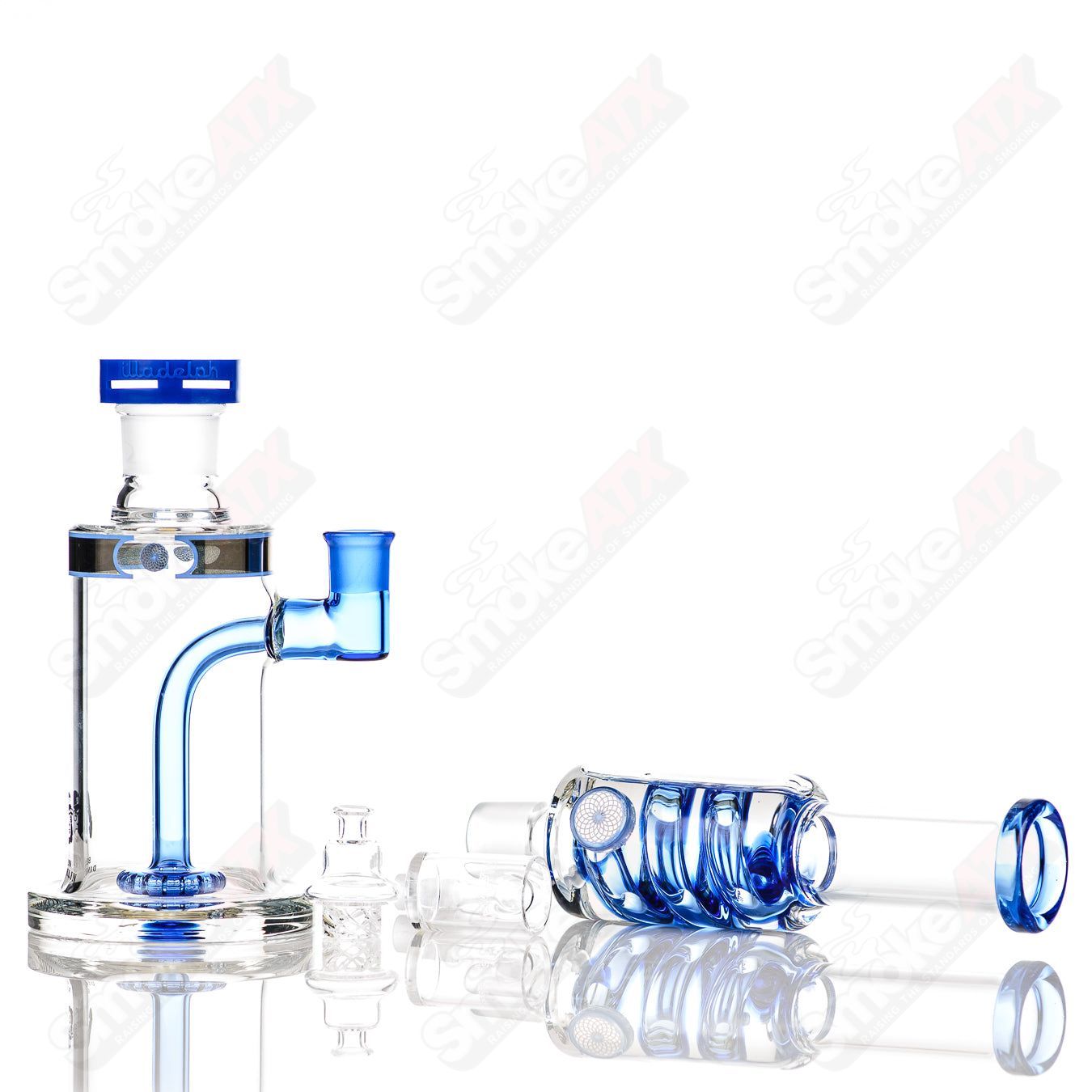 Illadelph Sea Blue Glycerin Coil Bubbler glass pipe with intricate design and blue accents, showcasing detailed craftsmanship.