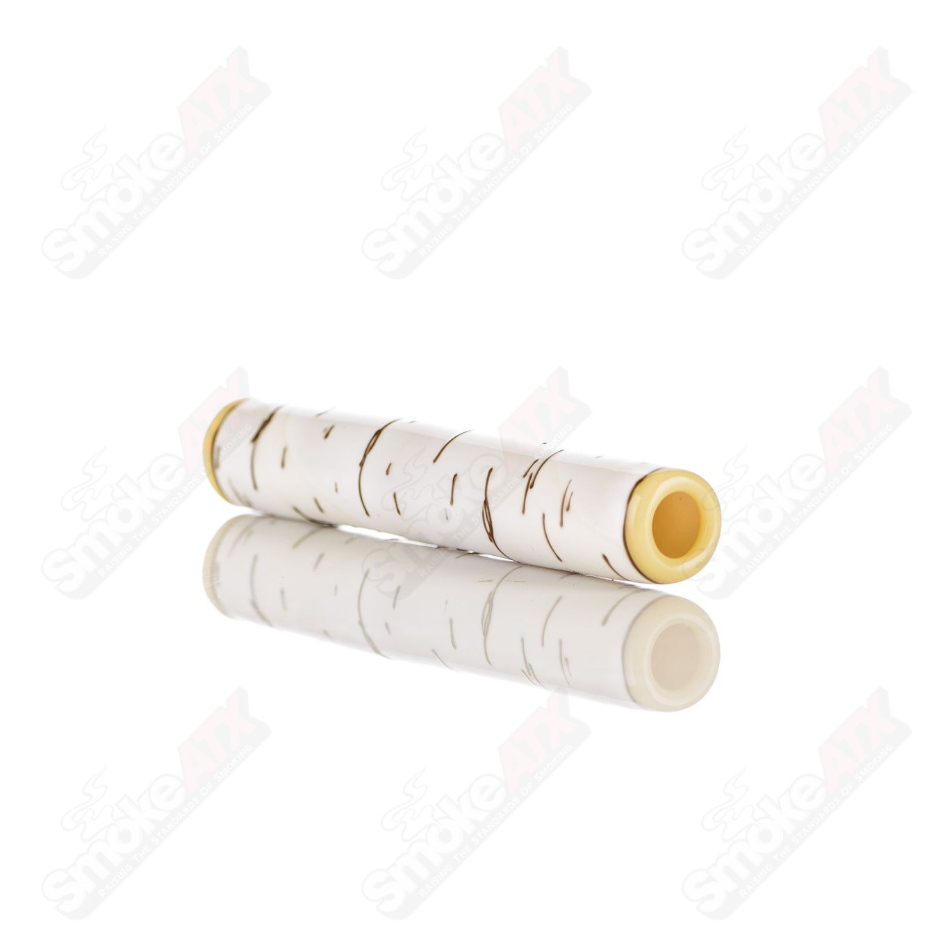 Foster Glass Birch Chillum made of clear heady glass with a smooth, rounded mouthpiece and intricate design details.