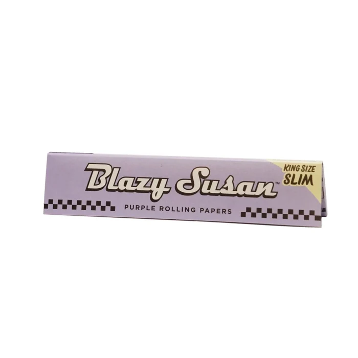 King size slim purple rolling papers from Blazy Susan, featuring vibrant purple packaging and rolled papers for smoking.