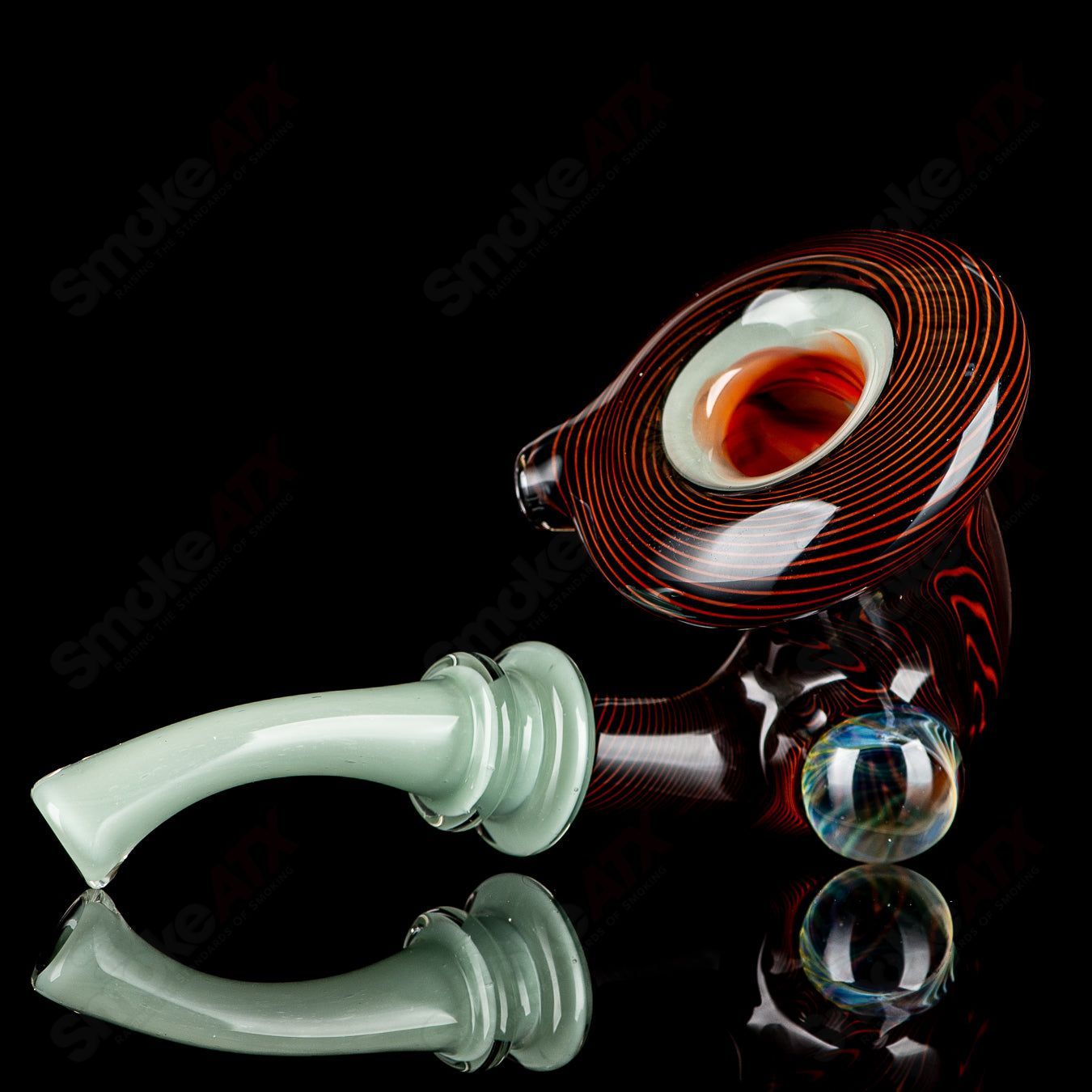 Black and orange Wig Wag Sherlock heady glass pipe with opal accent by JMass, featuring intricate design and vibrant colors.