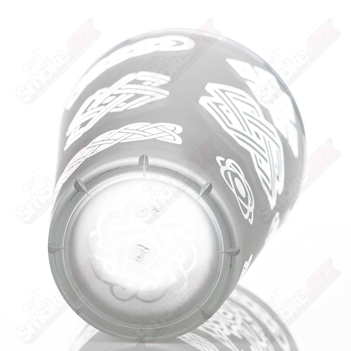 Blasted ancient patterns pint glass by Fatal Facets featuring intricate heady glass design with textured surface.