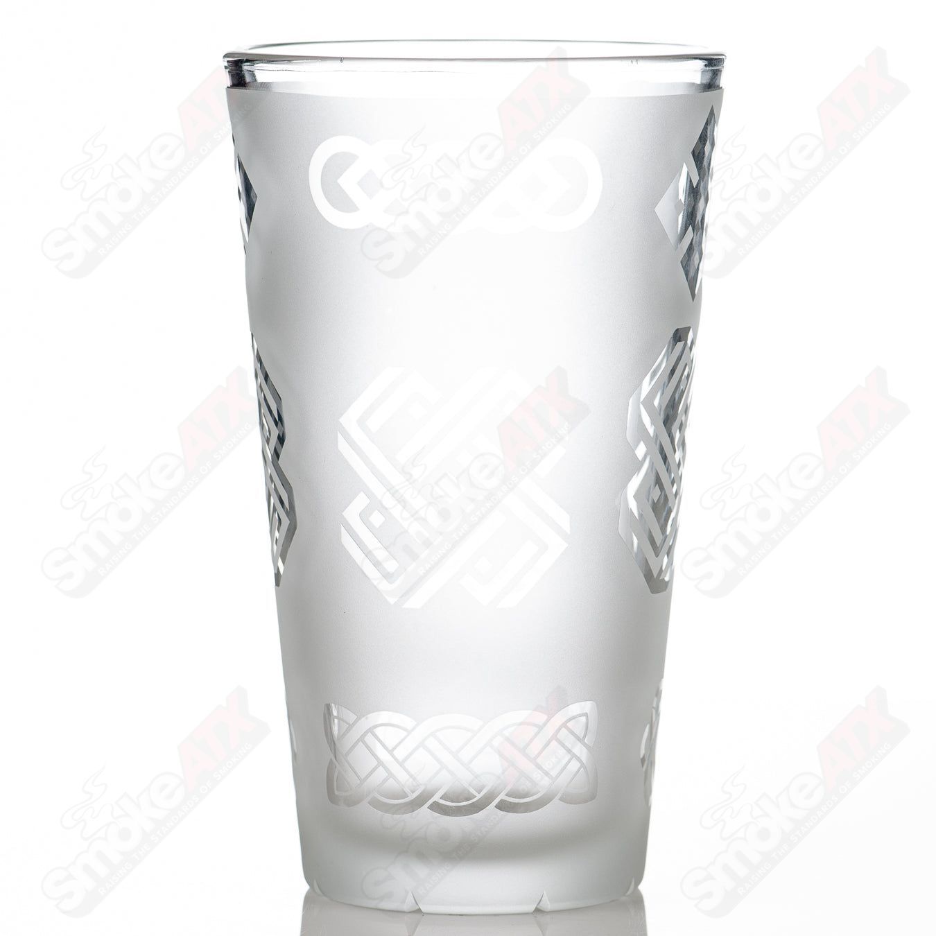 Heady glass pint glass with blasted ancient patterns and intricate faceted design by Fatal Facets.
