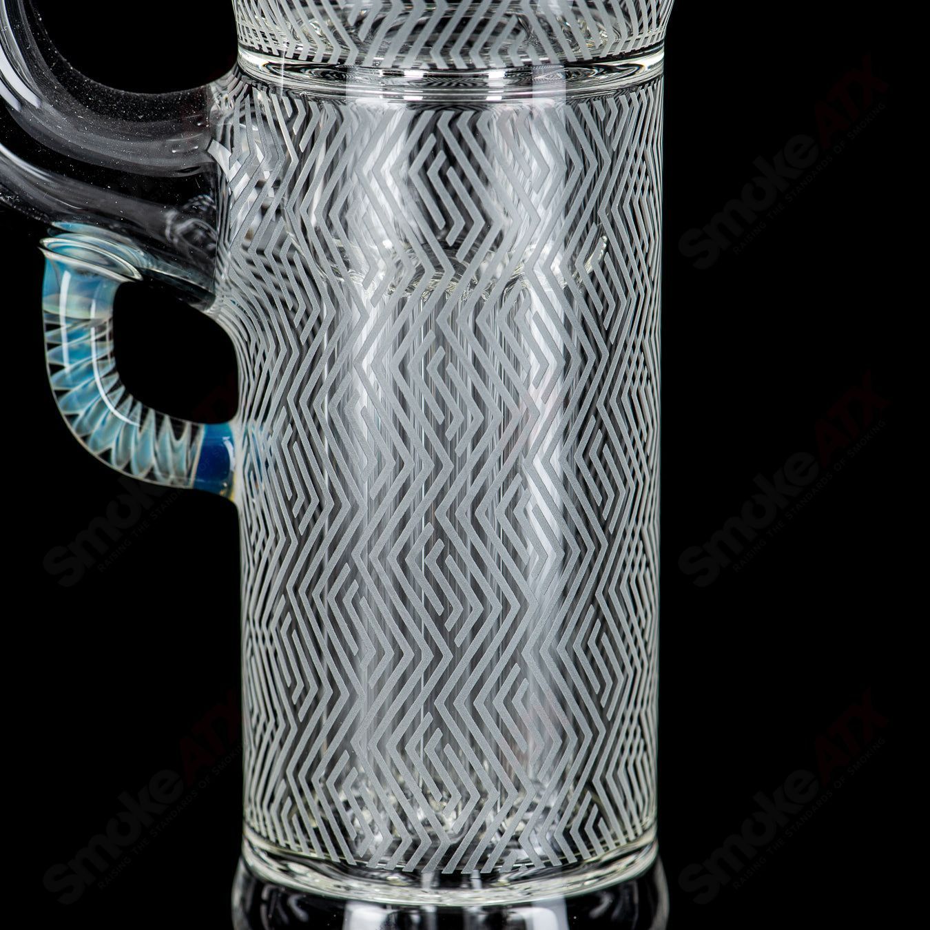 Heady glass bong with a straight neck, featuring a blasted Minor Deppe’s Darkness Peyote Hollow foot design by Sovereignty Glass.