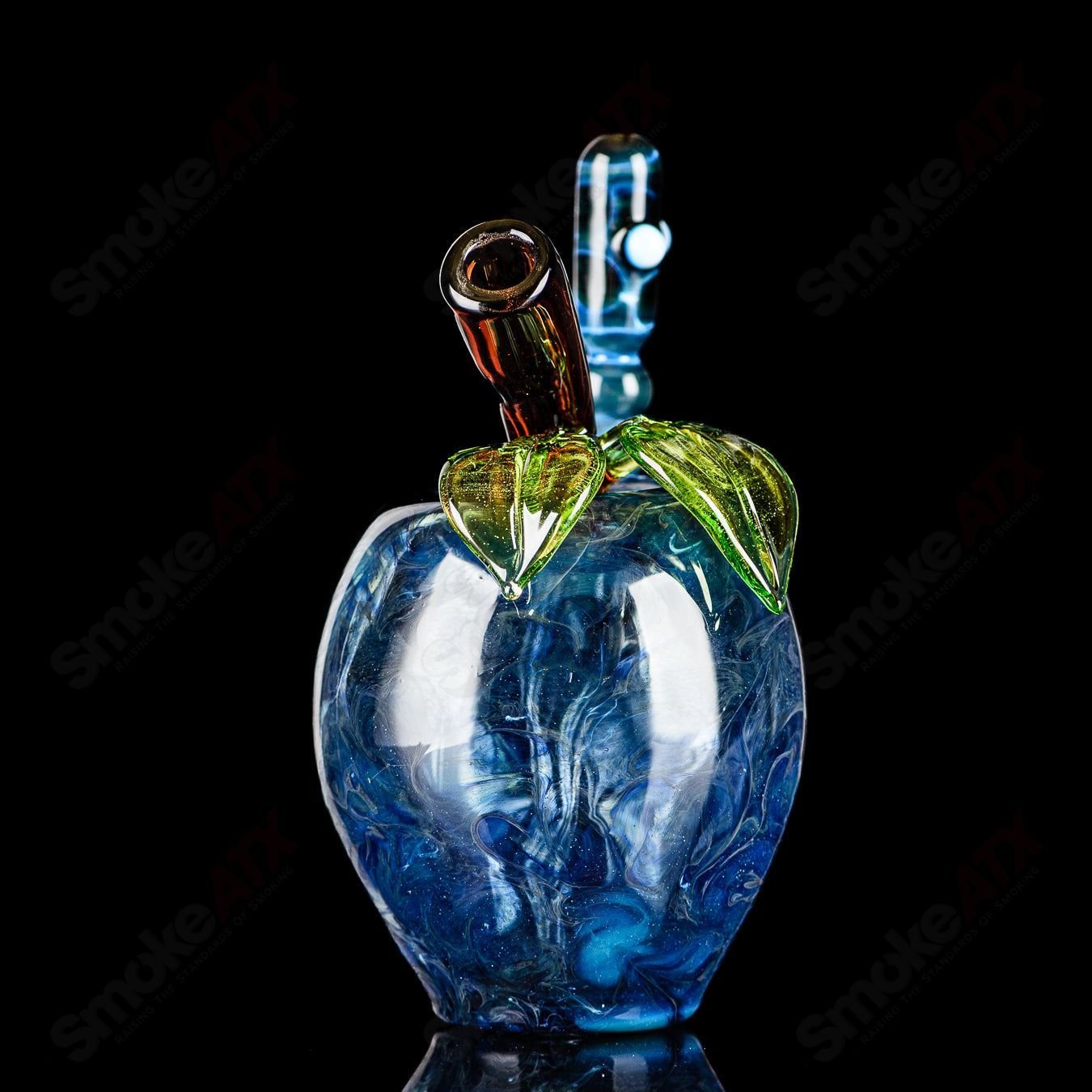 Blue Apple Rig with Worm Dabber and Pouch Glass, a colorful heady glass concentrate rig with detailed design and accessories.