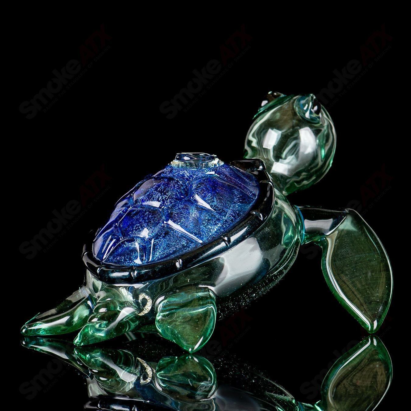 Blue dichro Honu sea turtle rig from Turtle Time, a glass concentrate rig featuring vibrant blue colors and turtle design.