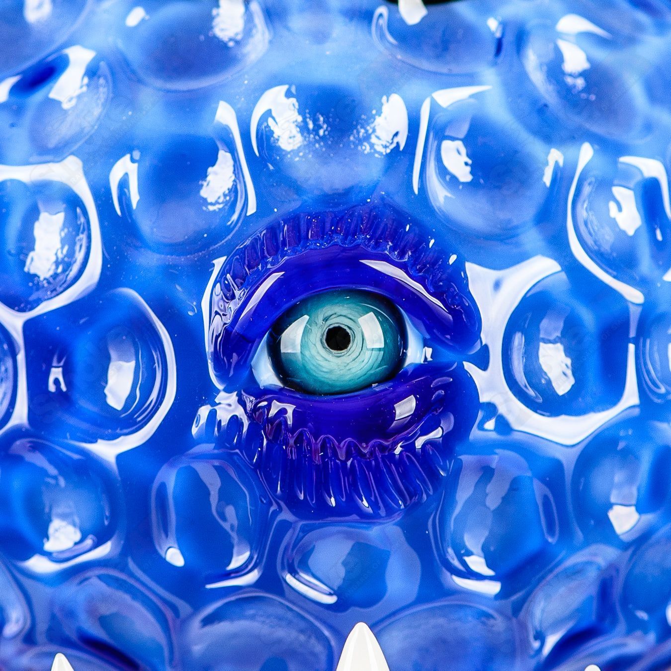 Brilliant blue Orb Rig by Salt & JAG, a heady glass concentrate rig with a striking blue orb design and intricate glasswork.