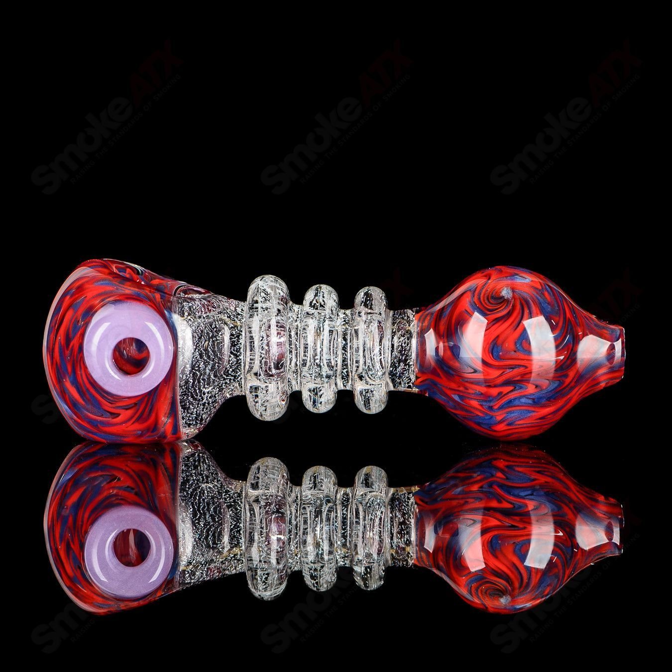 JMK Glass dichro red and transparent glass spoon pipe with triple maria signature, featuring a vibrant, colorful design.