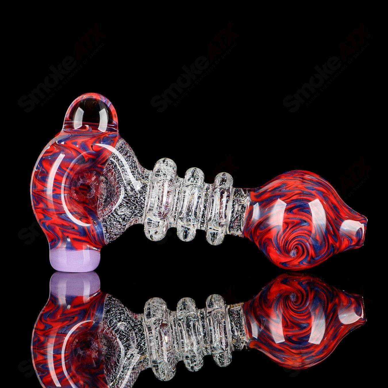 JMK Glass hand pipe featuring a Burple, red, and transparent dichro spoon design with triple Maria signature.