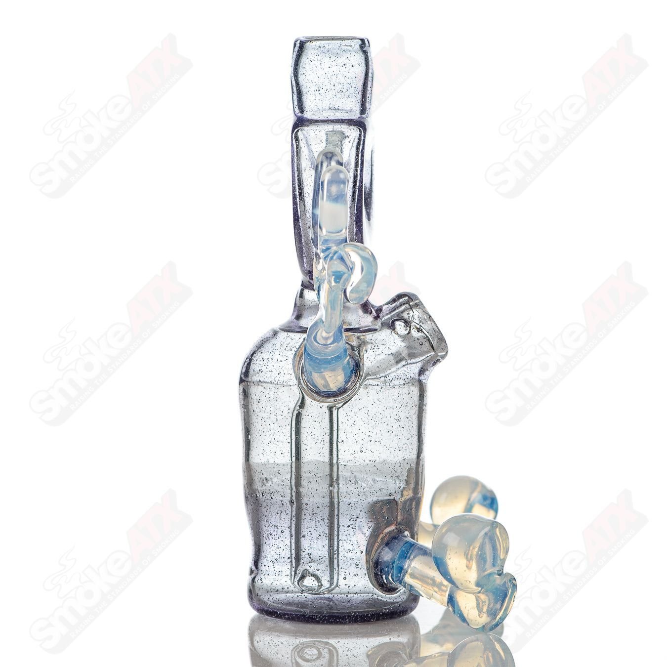 MJ Meltz CFL Sitter Rig, a heady glass concentrate rig with intricate design and vibrant colors, perfect for dabbing and concentrate use.