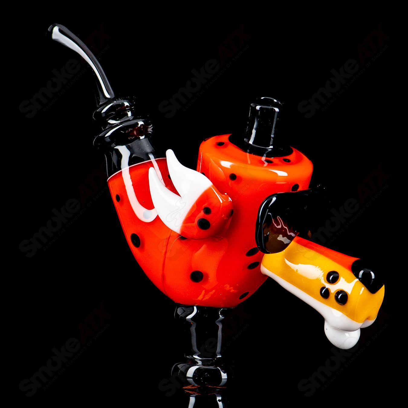 Heady glass Sherlocks pipe by JMass featuring Chesterlock Rudeboy design, showcasing detailed artistic glasswork.