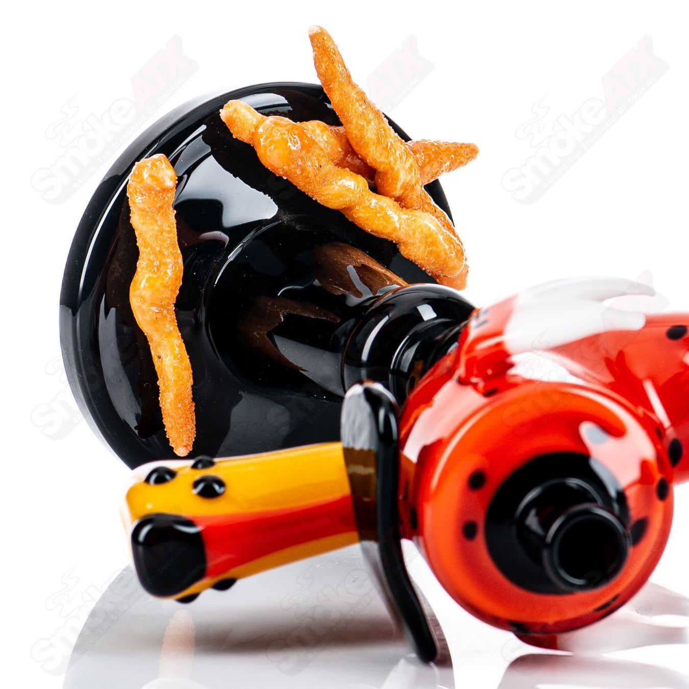 Heady glass Sherlock pipe by JMass featuring Chesterlock Rudeboy x JMass design with intricate details and colorful accents.